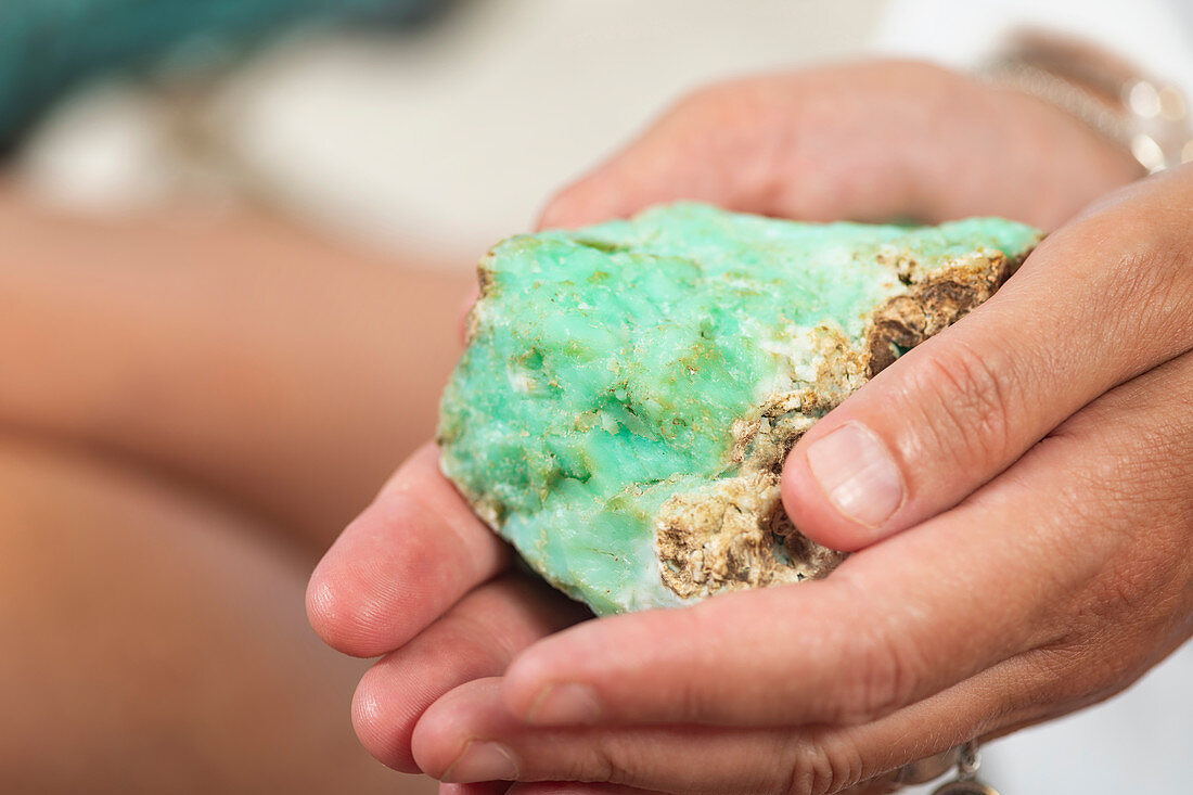 Crystal healing therapy with green chrysoprase crystal