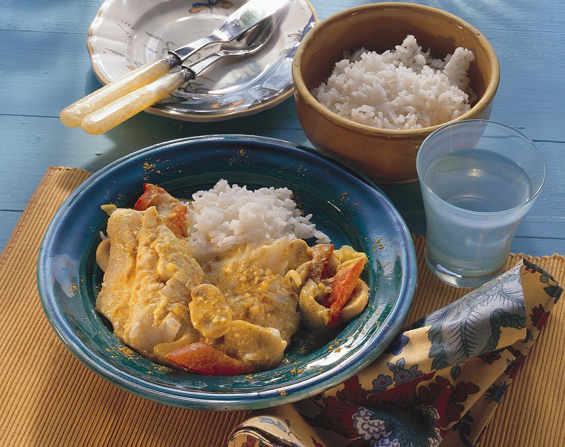 Poached red perch with curried vegetables and rice