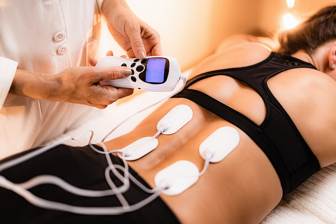 Physical therapy with TENS machine