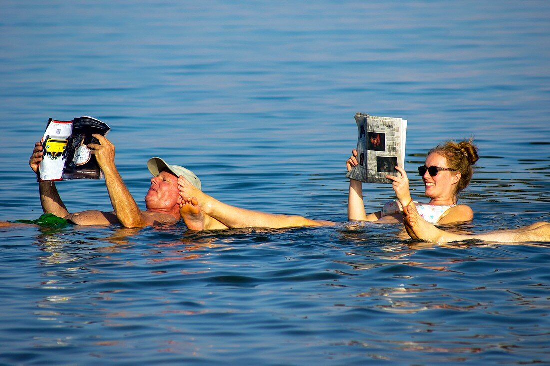 Tourists floating in the Dead Sea