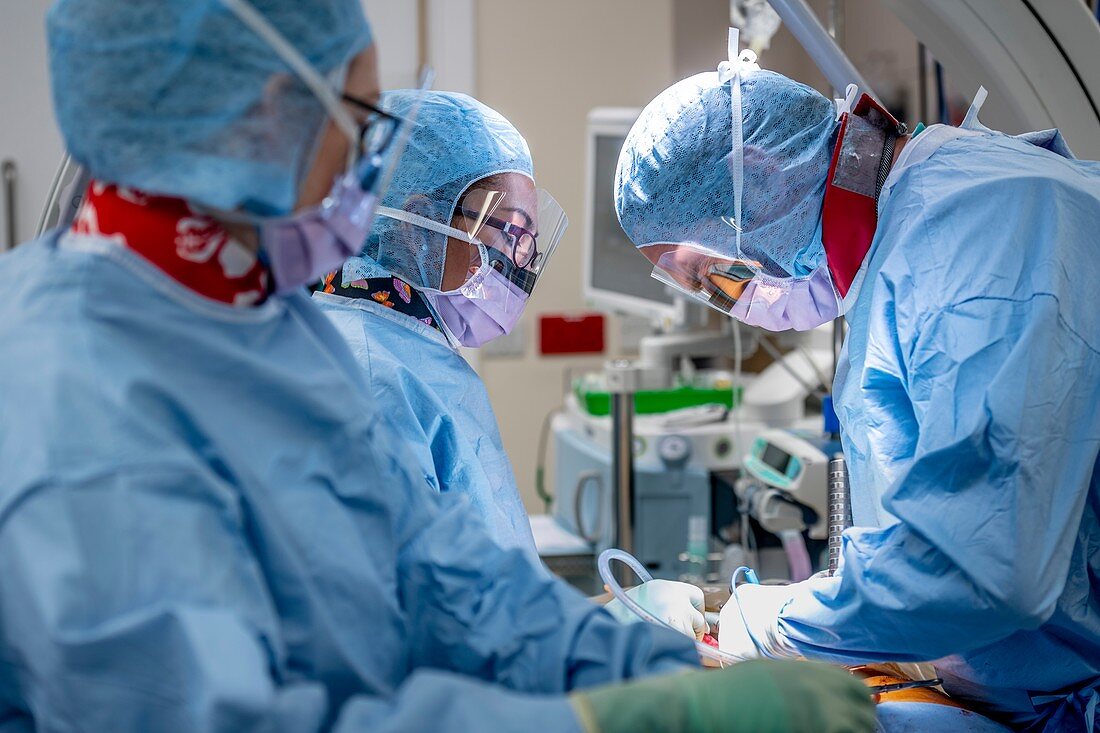Spinal surgeons performing an operation