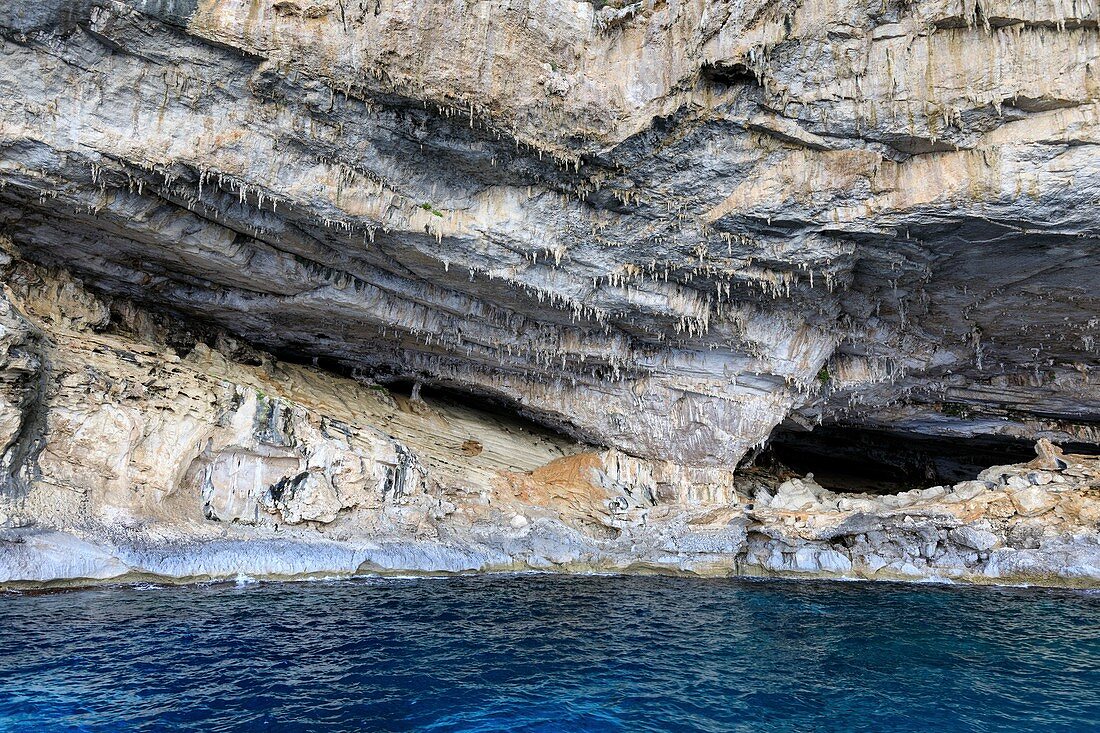 Former limestone cave now exposed to sea