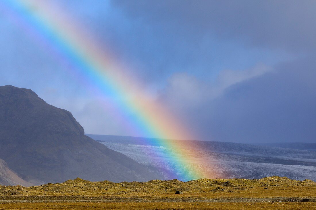 Rainbow over Icelandic glacier