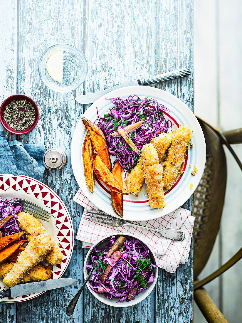 Crispy cod fingers with wedges and dill slaw