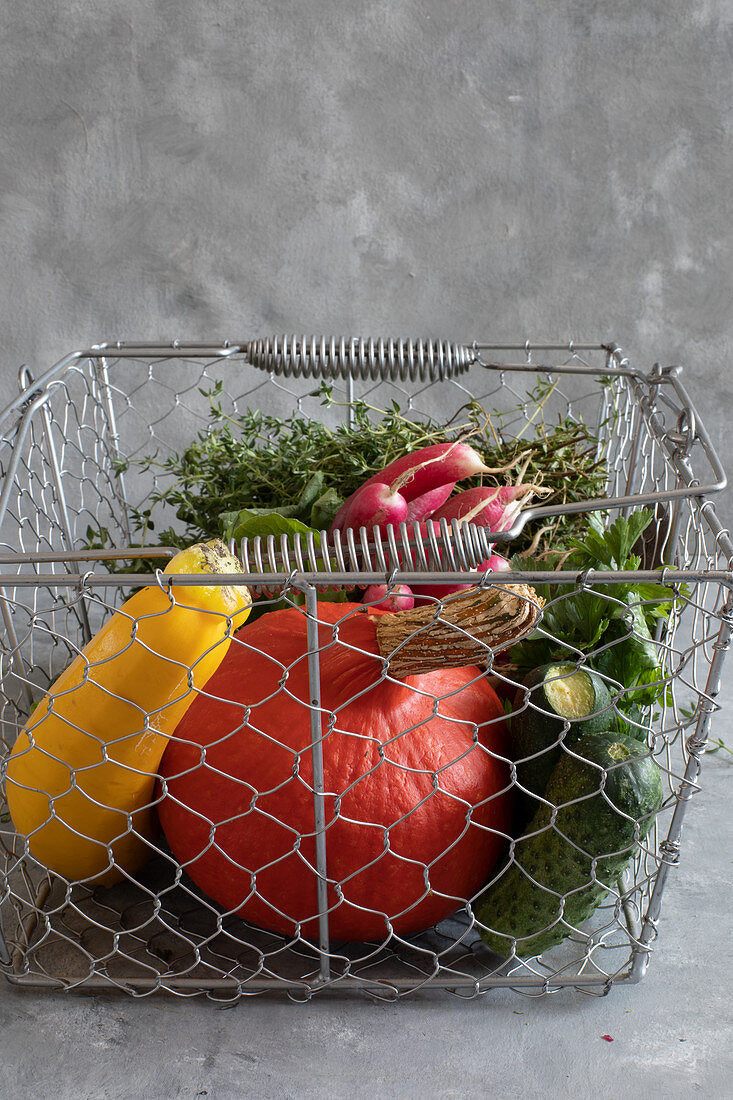 Fresh veg in a wire basket