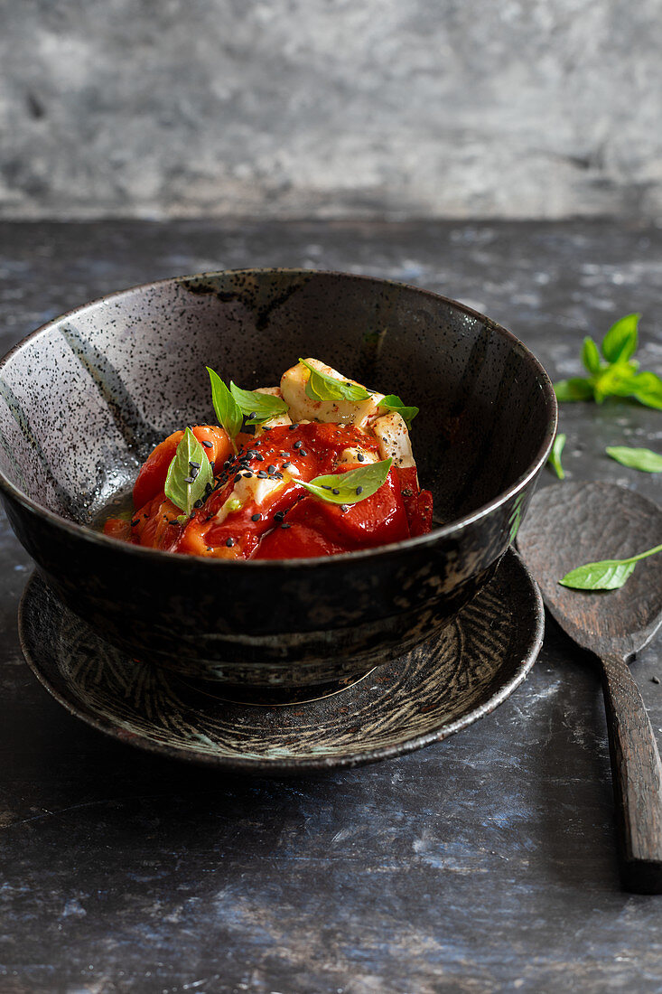 Red pepper brie terrine in a bowl