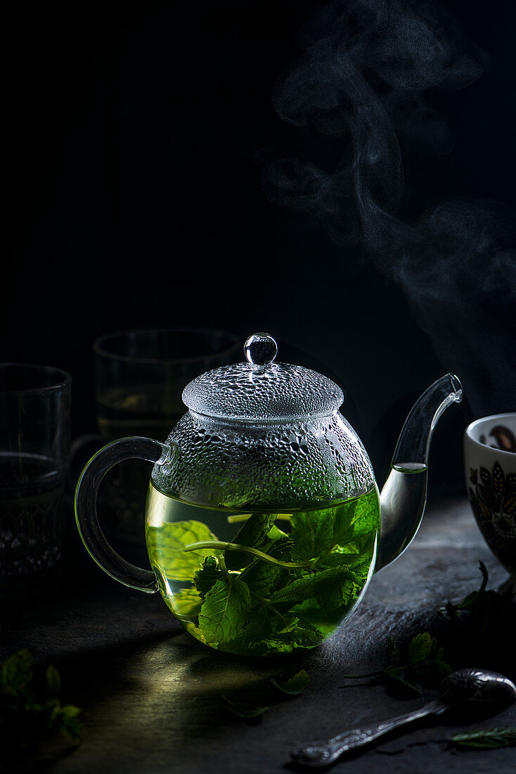 Fresh mint tea in a teapot