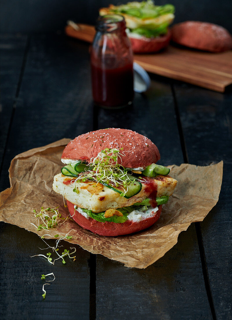 A beetroot burger with halloumi and ketchup