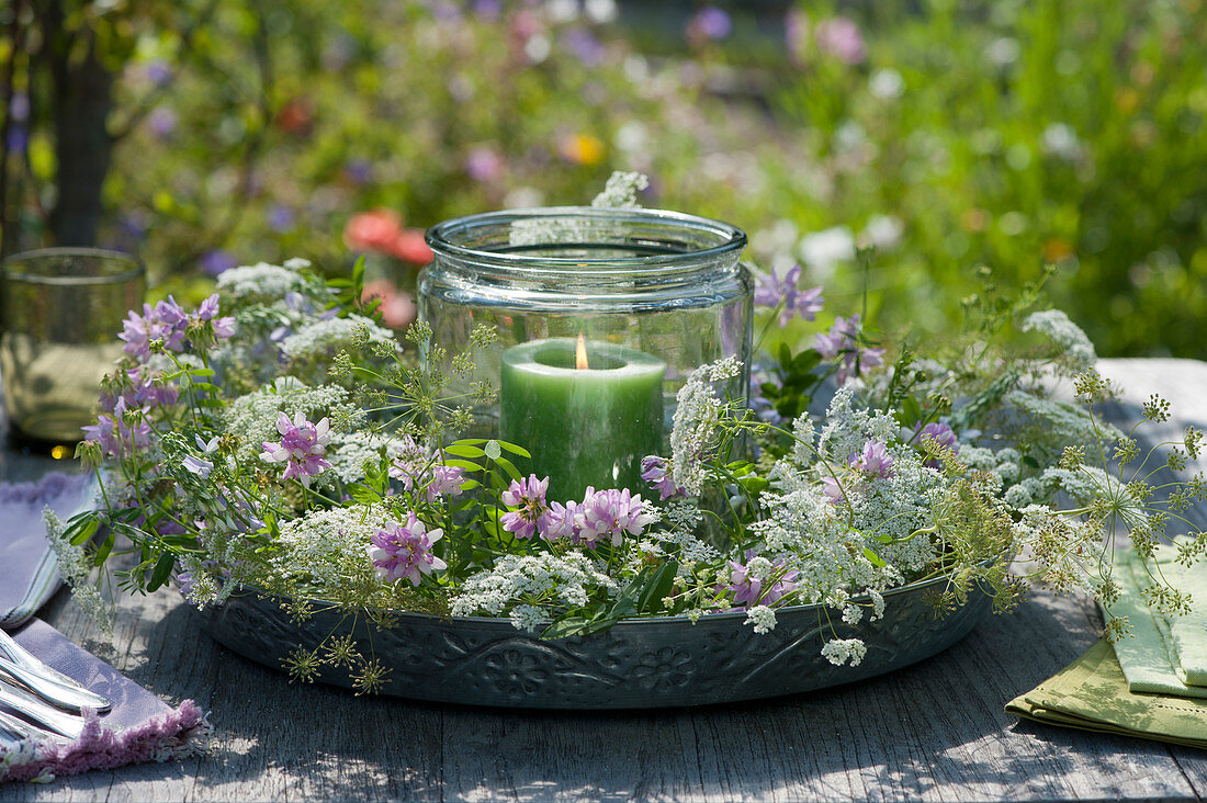 Lantern in a wreath of meadow flowers