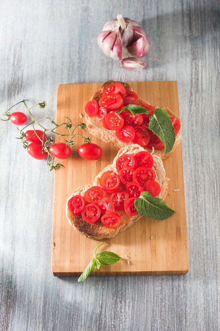 Toasted bread with tomatoes,garlic and herbs