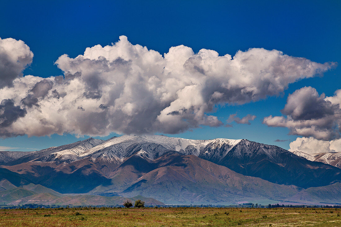 Cumulus humilis clouds over New Zealand mountains