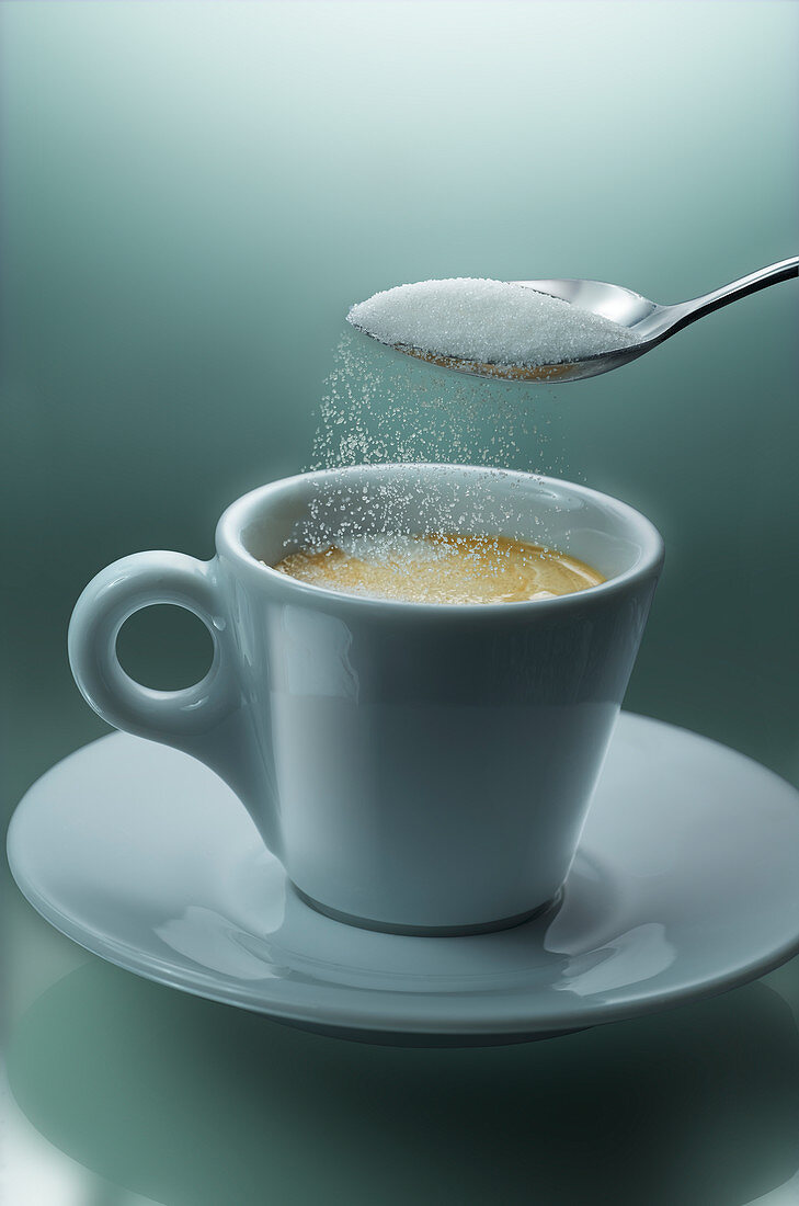 Adding sugar to coffee