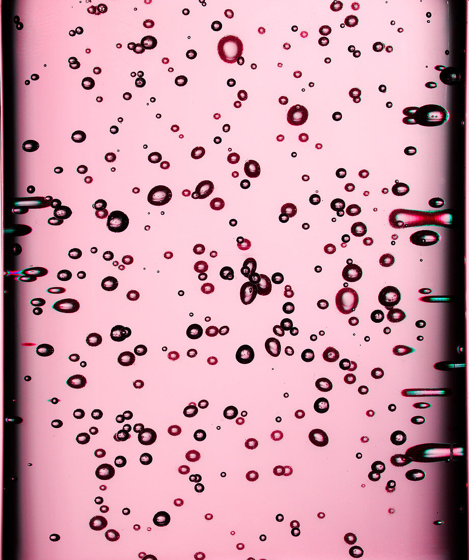 Pink bubbly liquid