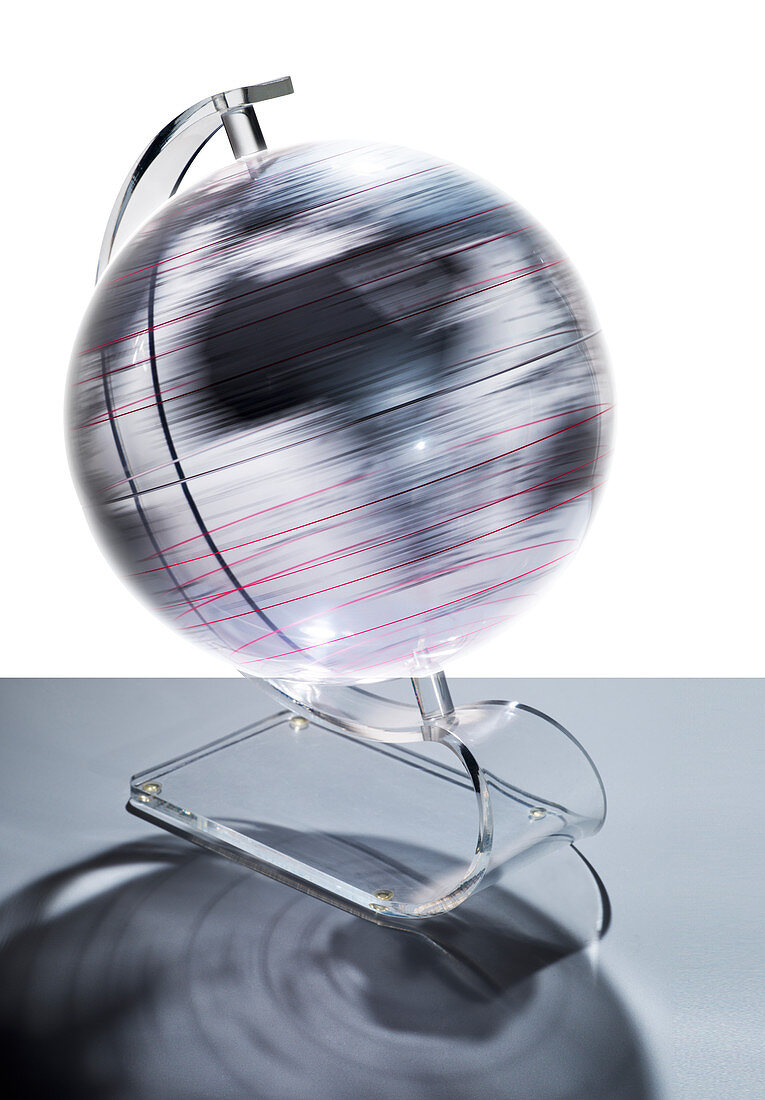 Transparent globe rotating at speed