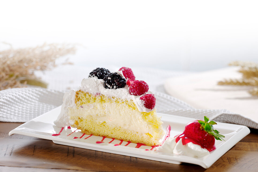 Cream filled cake with berries
