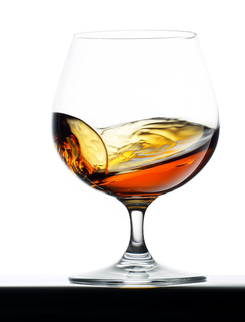 Brandy swirling in a glass
