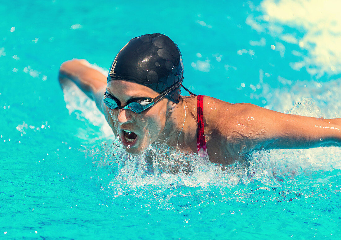 Woman swimming butterfly