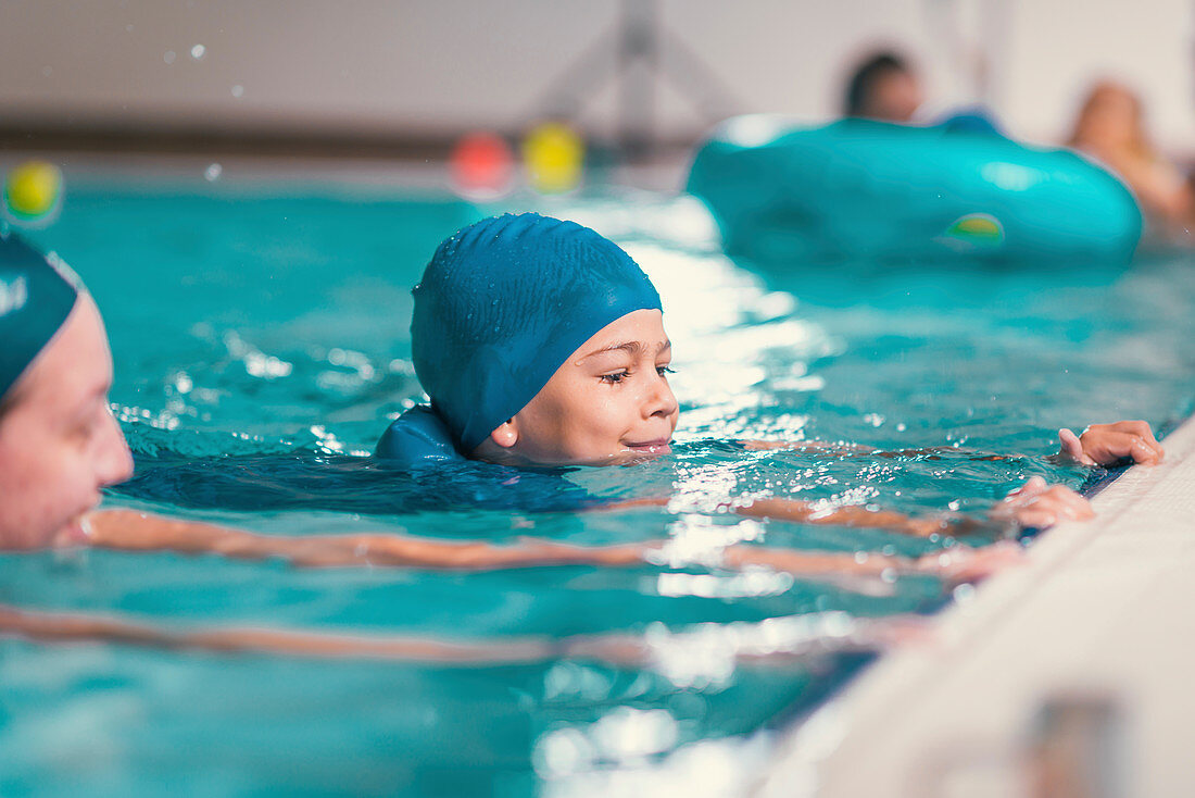 Boy in swimming class