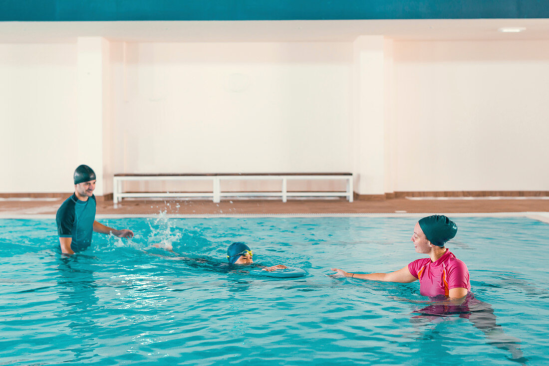 Boy in swimming class