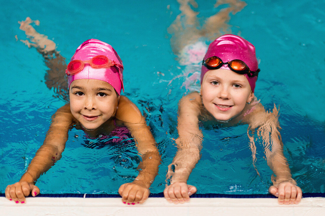 Little girls in swimming pool