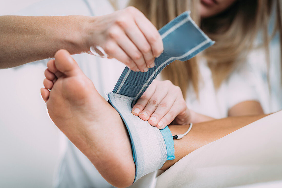 Placing TENS electrodes on ankle