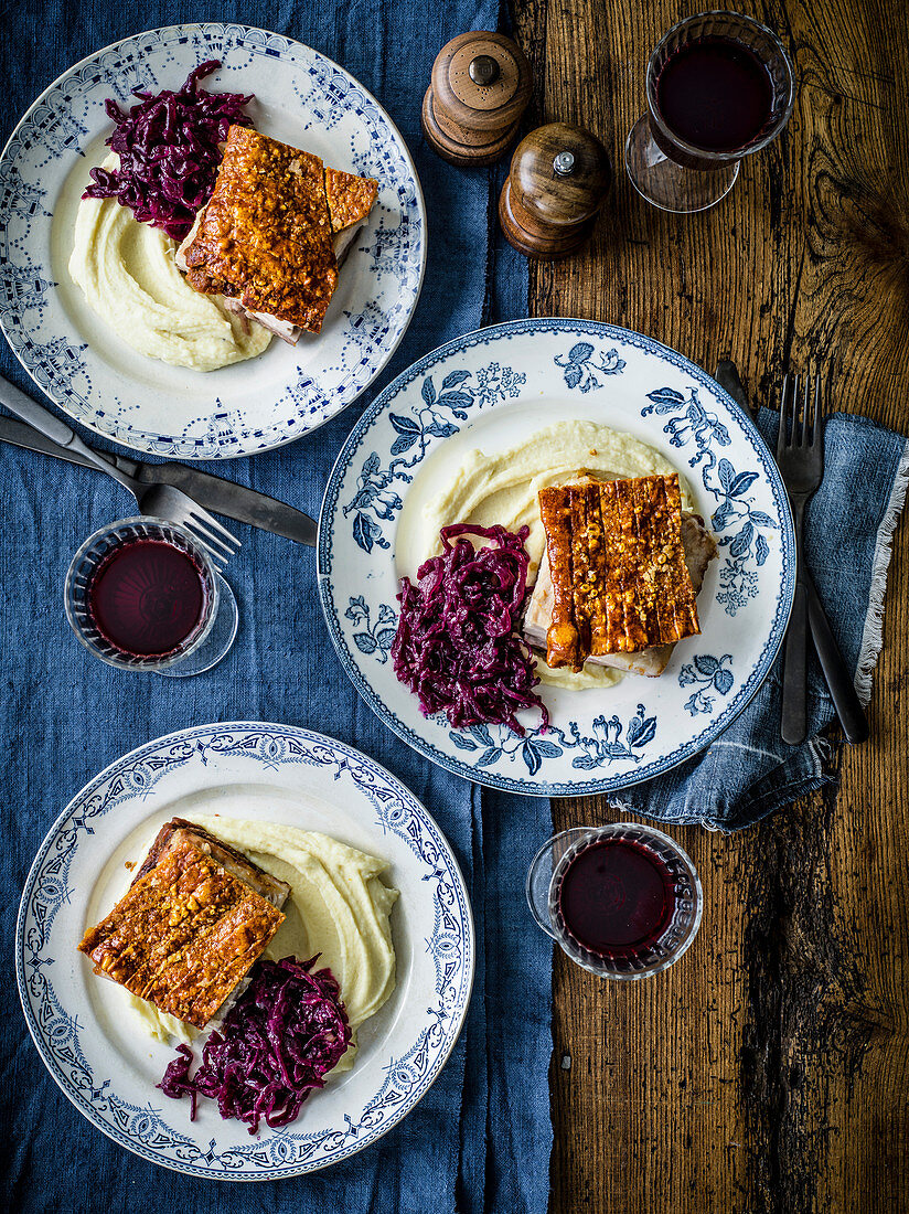 Slow cooked crispy pork with sweet and sour red cabbage and mustard puree