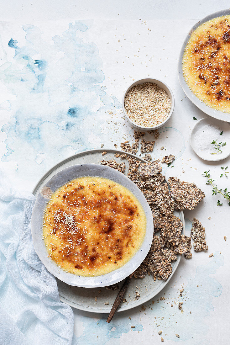 Baked gorgonzola and sweetcorn brûlée with seed crackers