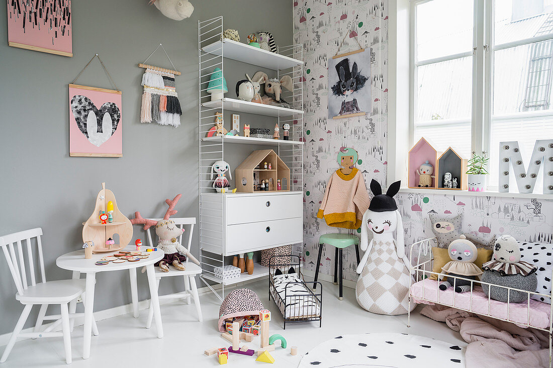 Lavishly decorated, vintage-style nursery in shades of grey