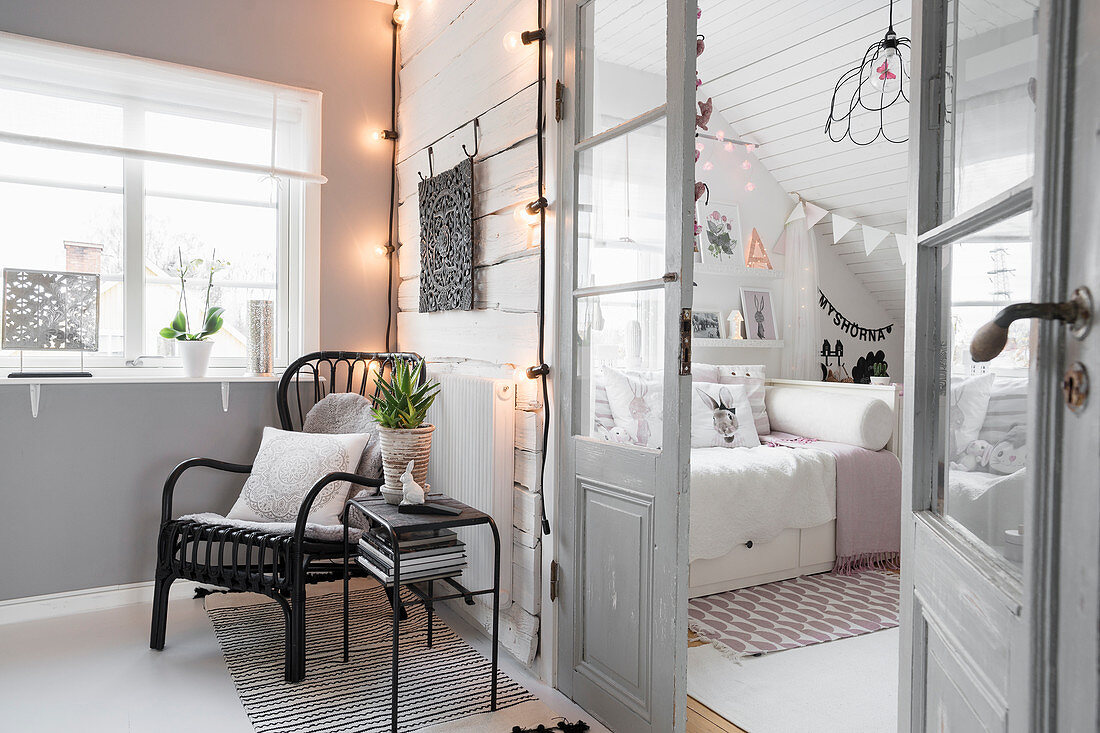 Open lattice doors and view into child's bedroom