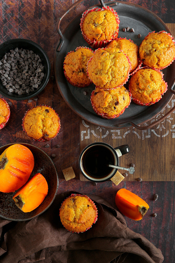 Persimmon muffins with chocolate drops