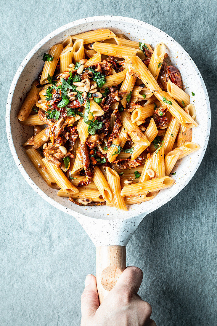 Penne in cream sauce with dried tomatoes