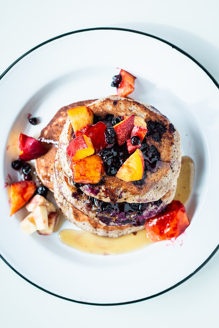 Gluten-free pancakes with blueberries and nectarines