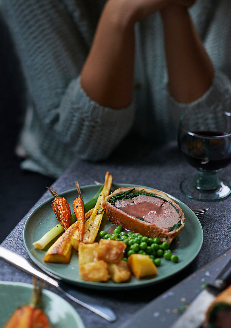 Beef Wellington with spinach and bacon