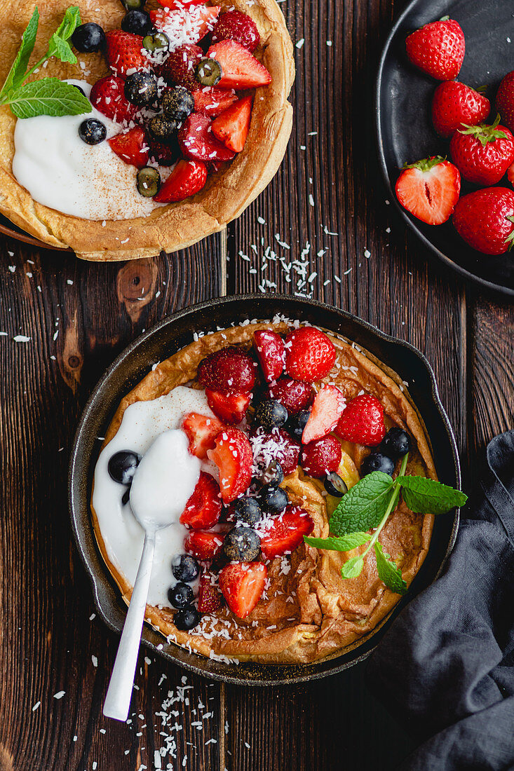 Dutch Baby with berries and coconut yoghurt