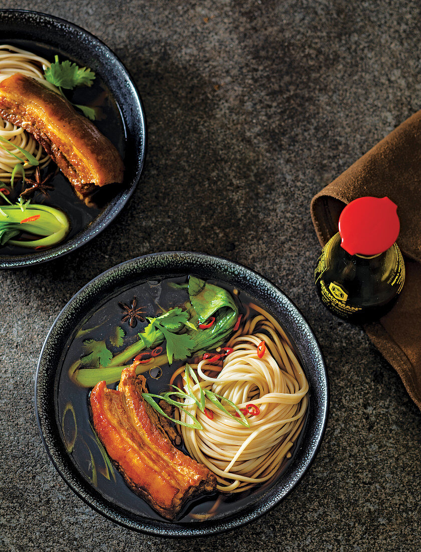 Chinese braised pork belly, egg noodles and pak choi