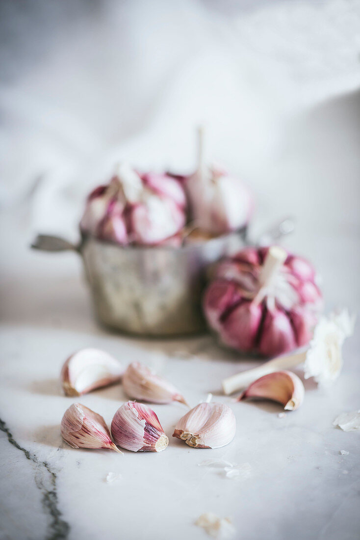 Close-up of a plate of pink garlic