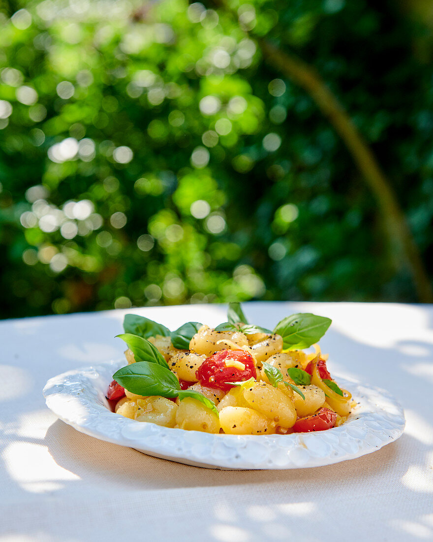 Semolina gnocchi with cherry tomatoes and basil