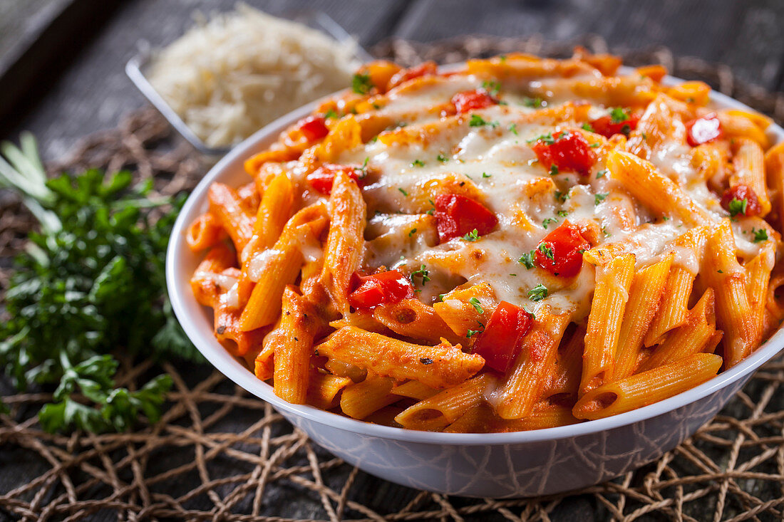 Penne pasta with tomatoes and cheese