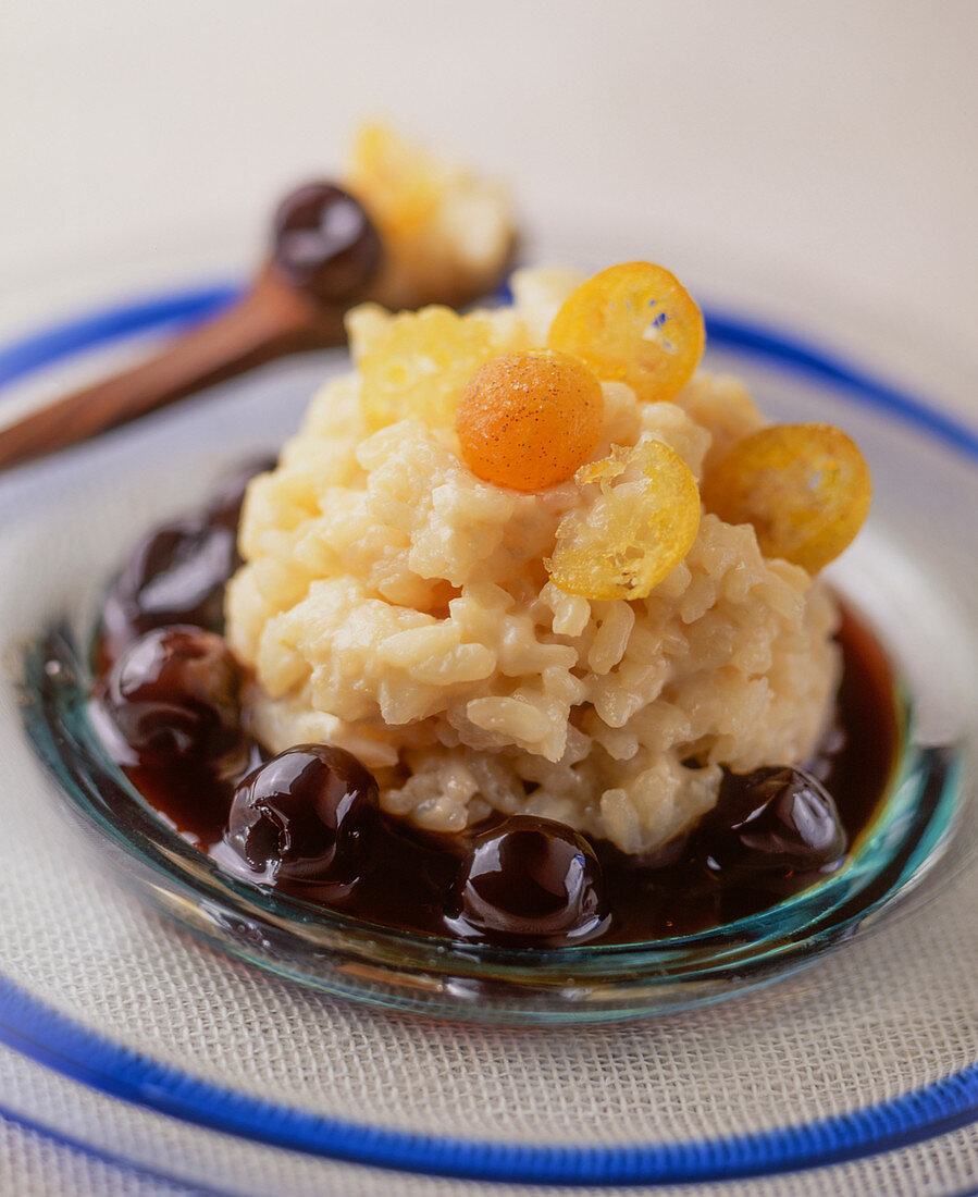 Rice pudding with cherries and kumquats