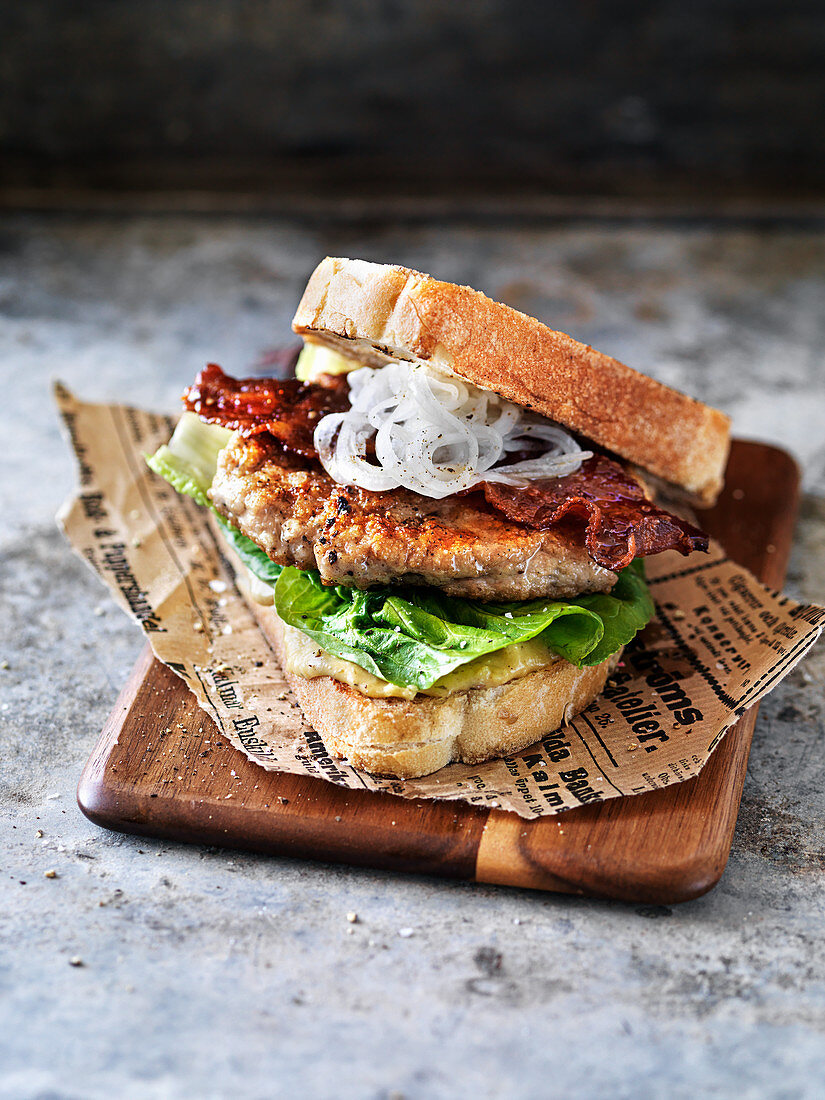 Chicken Ceasar burger with baked bacon