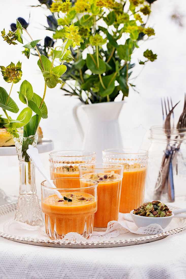 Cold carrot soup with pistachios
