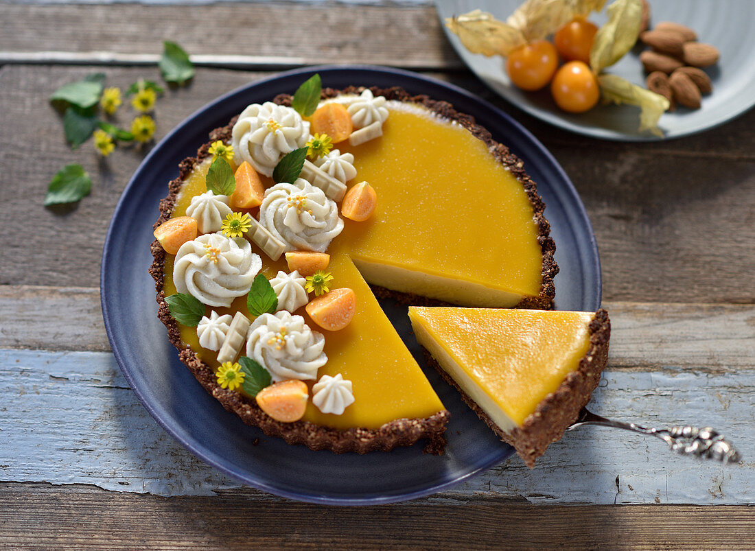 Vegan chocolate orange cake with a crispy base, sliced