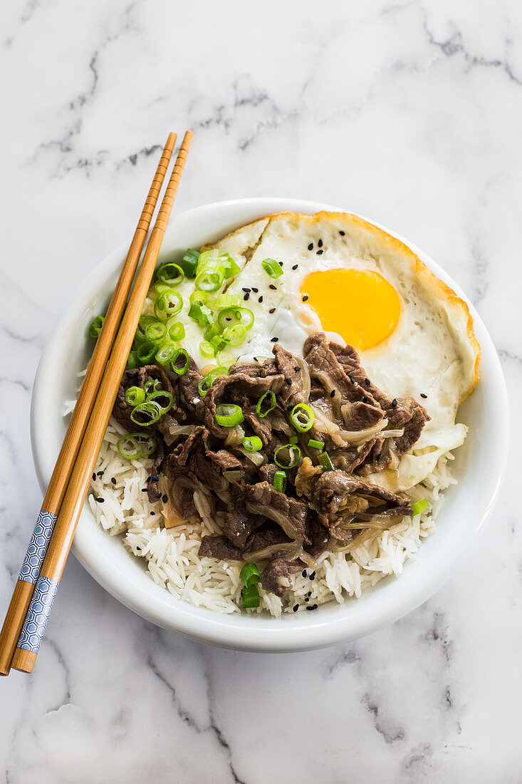 Gyudon bowl with rice, beef and fried egg
