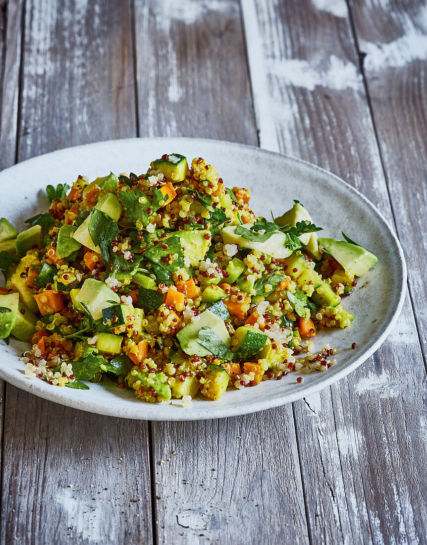 Ayurvedic quinoa salad with carrots, zucchini and celery