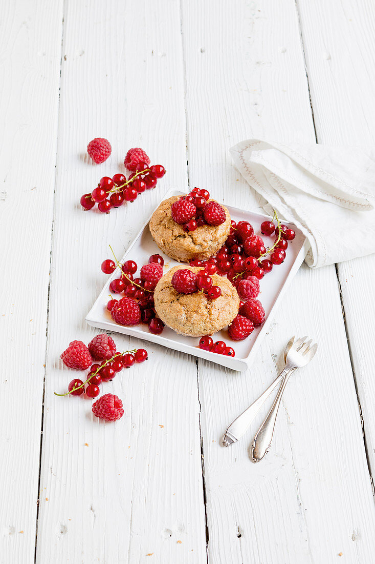 Almond cakes with red berries