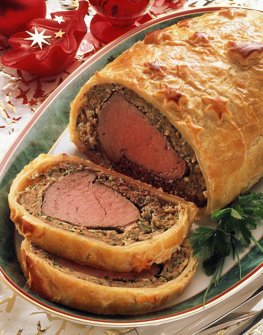 Beef fillet with mince and herb crust in puff pastry