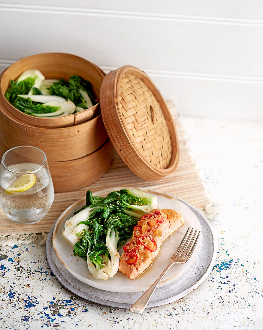 Ginger salmon parcels with sesame greens