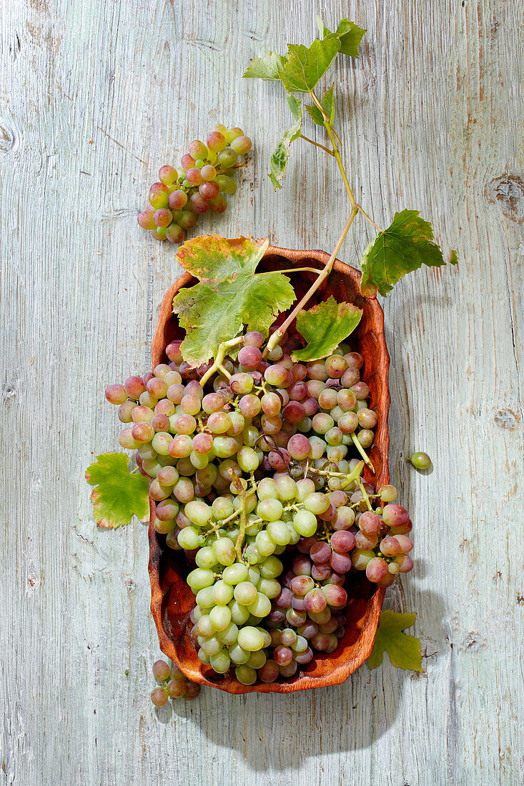 Grapes in a wooden dish