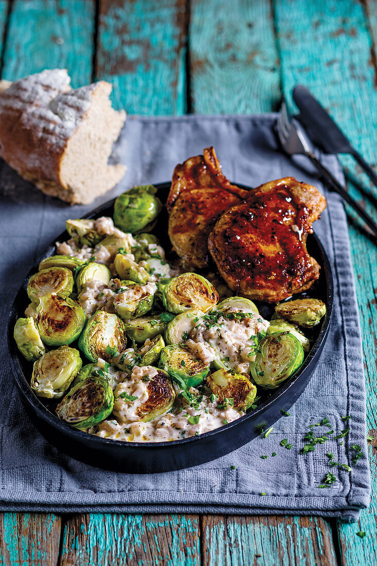 Pork chops with garlic-coconut brussels sprouts