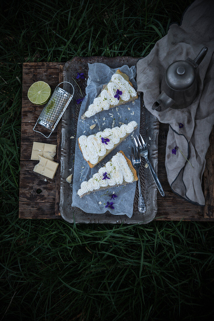 Vegan nut cake with lime curd and rice milk chocolate cream